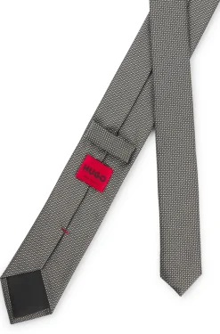 Silk tie with jacquard-woven pattern