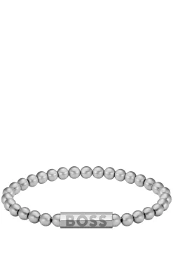 Silver-tone cuff with logo closure