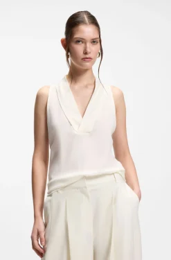 Sleeveless blouse in sandwashed silk with V neckline