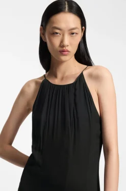 Sleeveless dress with plissé skirt inserts