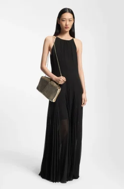 Sleeveless dress with plissé skirt inserts