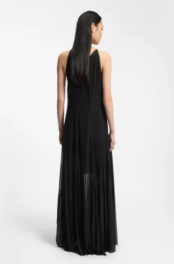 Sleeveless dress with plissé skirt inserts