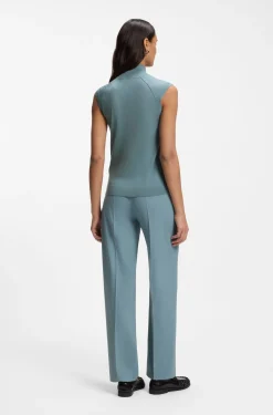 Sleeveless mock-neck sweater in merino wool