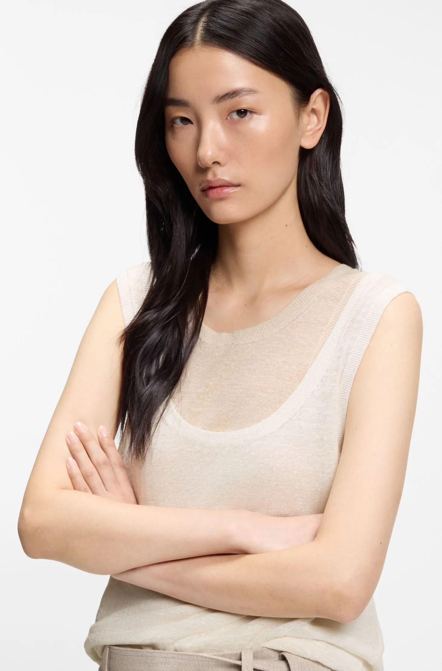 Sleeveless top in linen and cotton with layered design