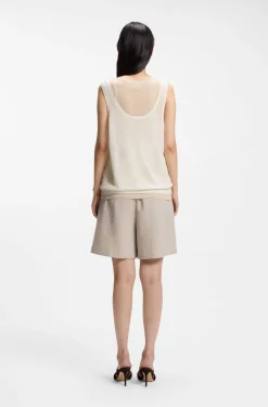 Sleeveless top in linen and cotton with layered design