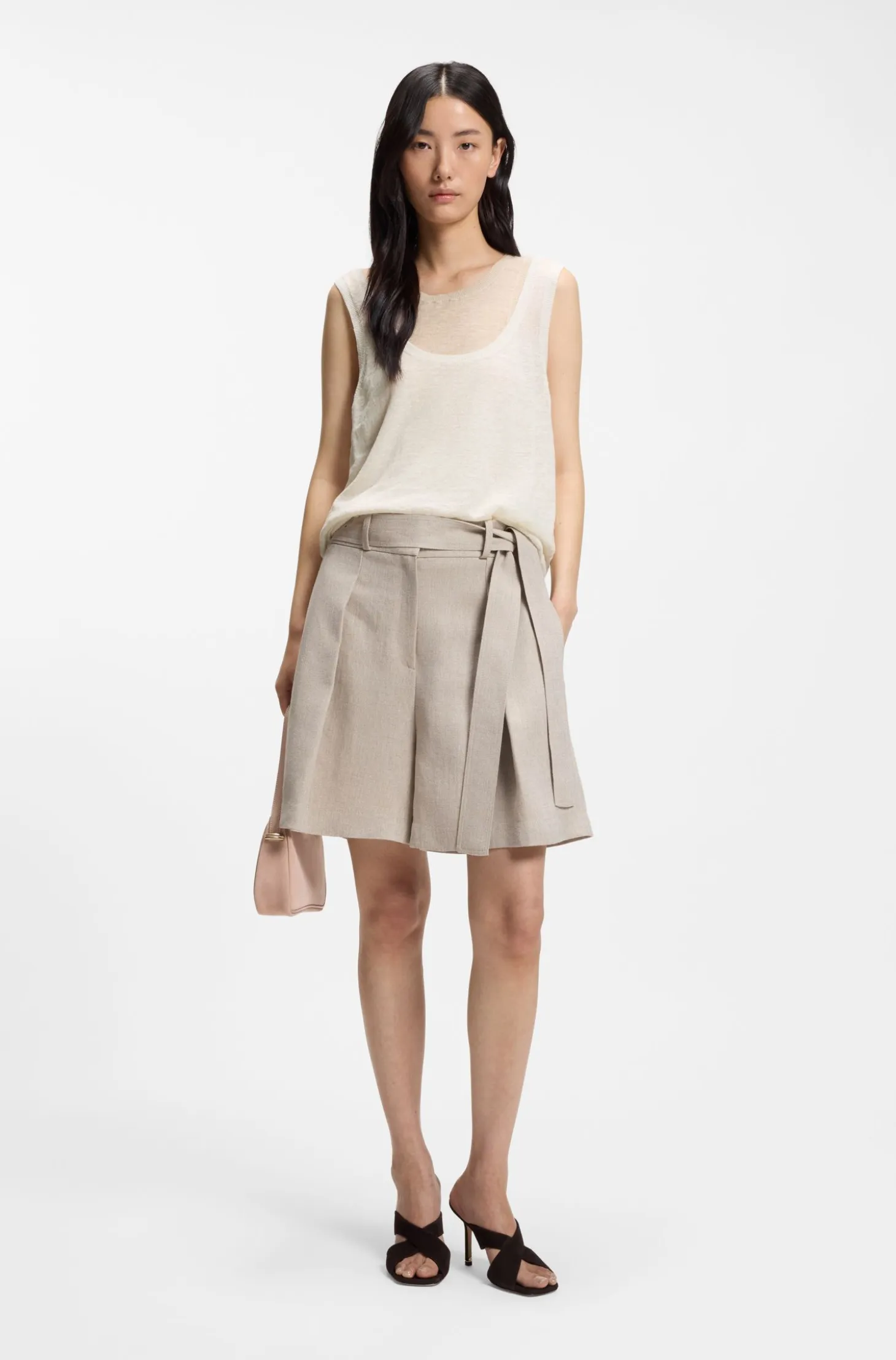 Sleeveless top in linen and cotton with layered design
