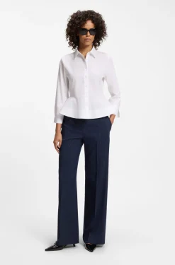 Slim-fit blouse in cotton with peplum hem