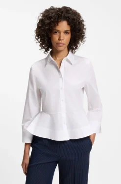 Slim-fit blouse in cotton with peplum hem