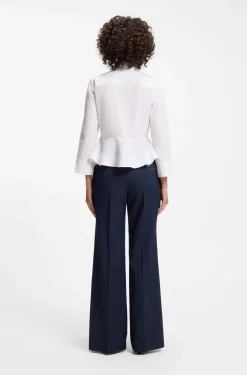 Slim-fit blouse in cotton with peplum hem