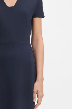 Slim-fit dress with piped waist