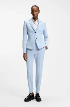 Slim-fit trousers in stretch fabric with logo rivet