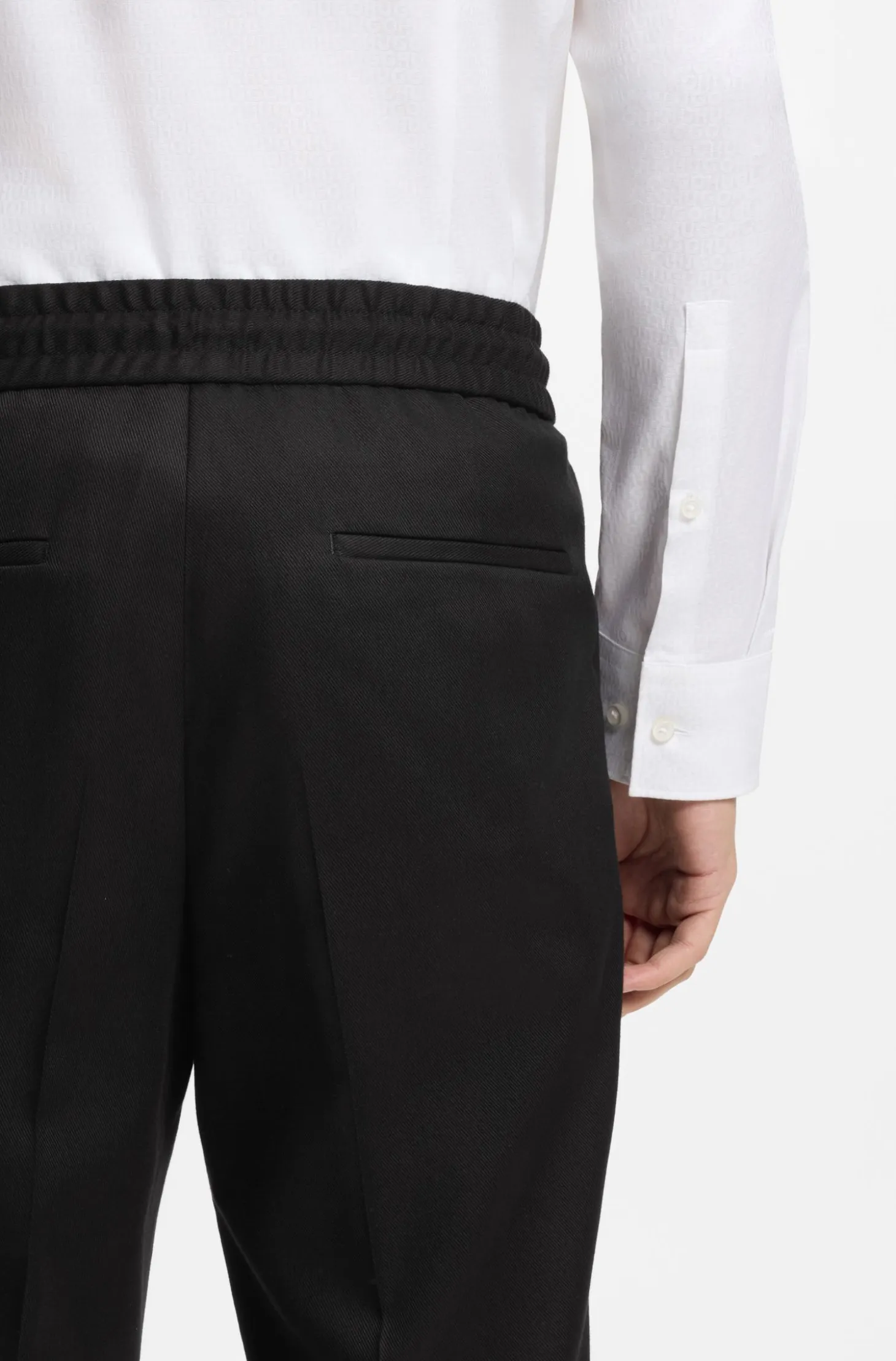 Slim-fit trousers in twill fabric with drawstring waist