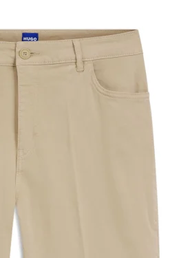 Slim-fit trousers with flared leg