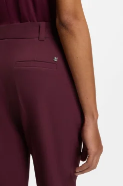 Slim-fit trousers with zip hems