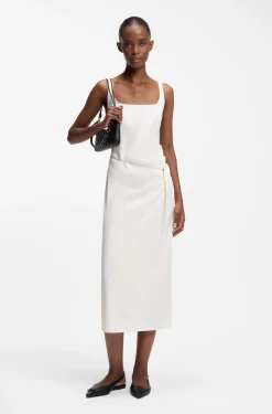 Square-neck dress with golden chain belt
