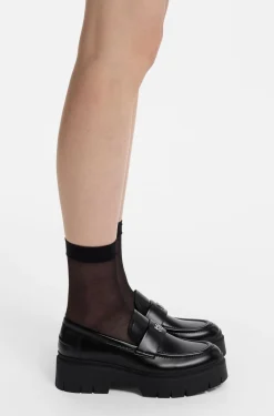 Stacked-logo loafers in faux leather