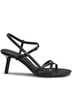 Strappy sandals in leather with asymmetric heel