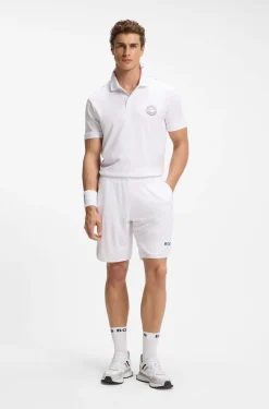 Stretch-cotton polo shirt with tennis-inspired logo