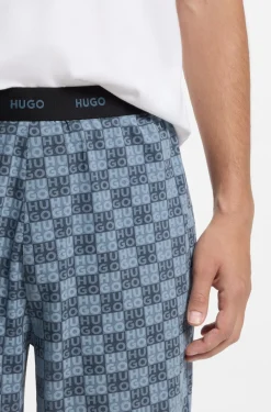 Stretch-cotton pyjama bottoms with stacked-logo print