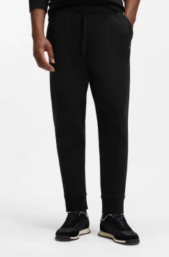 Stretch-cotton tracksuit bottoms with logo print