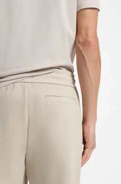 Stretch-cotton tracksuit bottoms with cuffed hems
