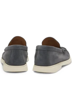 Suede loafers with embossed logo