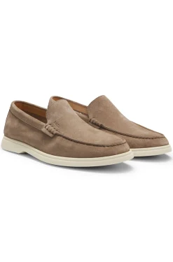 Suede loafers with embossed logo