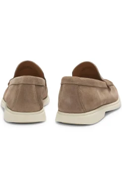 Suede loafers with embossed logo