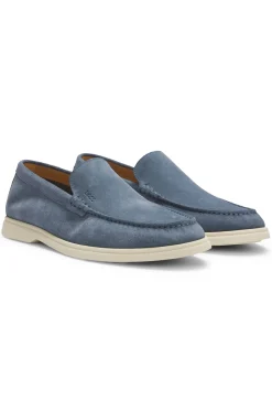 Suede loafers with embossed logo