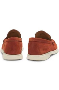 Suede loafers with embossed logo