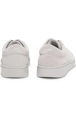 Suede trainers with gold-tone foil logo