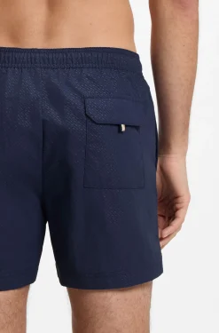 Swim shorts with all-over monogram print