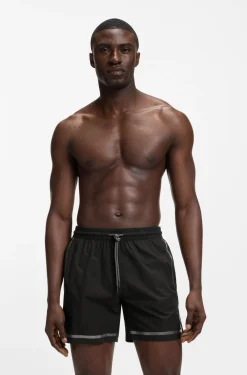 Swim shorts with logo stripe print