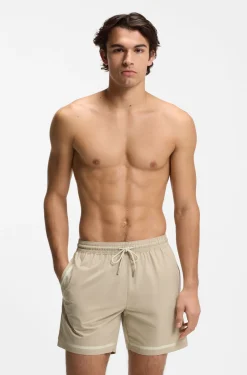 Swim shorts with logo stripe print