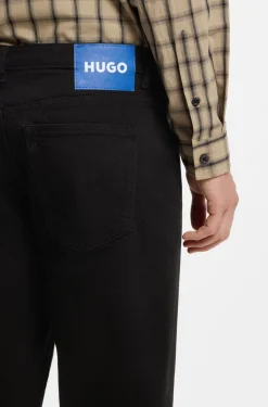 Tapered-fit jeans in black stretch denim