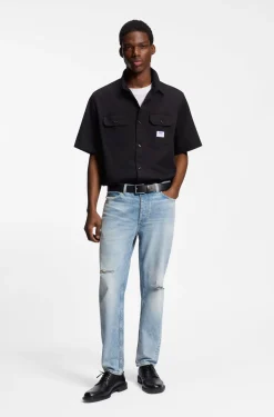 Tapered-fit jeans in light-blue distressed denim