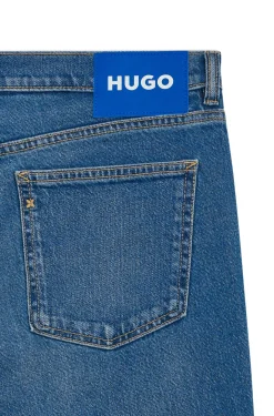 Tapered-fit jeans in mid-blue stretch denim