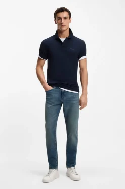 Tapered-fit jeans in washed-blue stretch denim