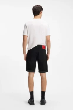 Tapered-fit shorts in black stretch denim