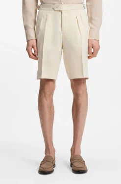 Tapered-fit shorts in linen with front pleats