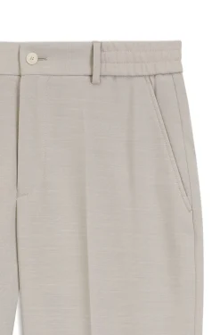 Tapered-fit trousers in micro-patterned virgin wool