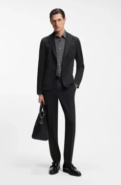 Tapered-fit trousers in stretch seersucker