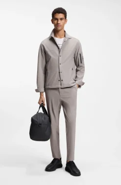 Tapered-fit trousers in waffle-structured stretch fabric