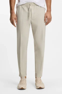 Tapered-fit trousers in water-repellent stretch fabric