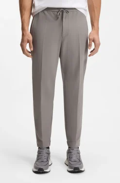 Tapered-fit trousers in water-repellent stretch fabric