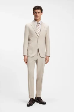 Tapered-fit trousers in wool-blend seersucker fabric