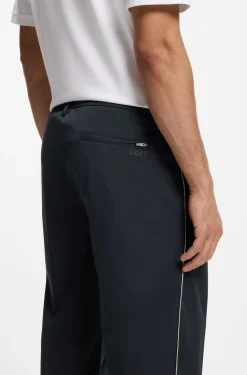 Tapered-fit trousers with water-repellent finish