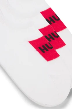 Three-pack of invisible socks with red logo labels