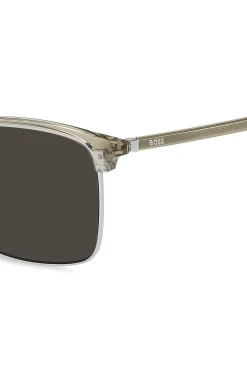 Titanium-temple sunglasses with lasered-engraved logos