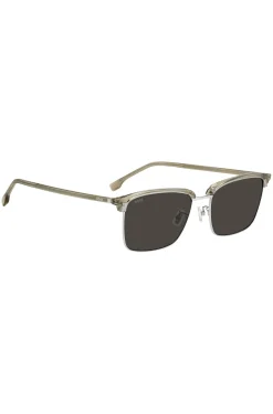 Titanium-temple sunglasses with lasered-engraved logos